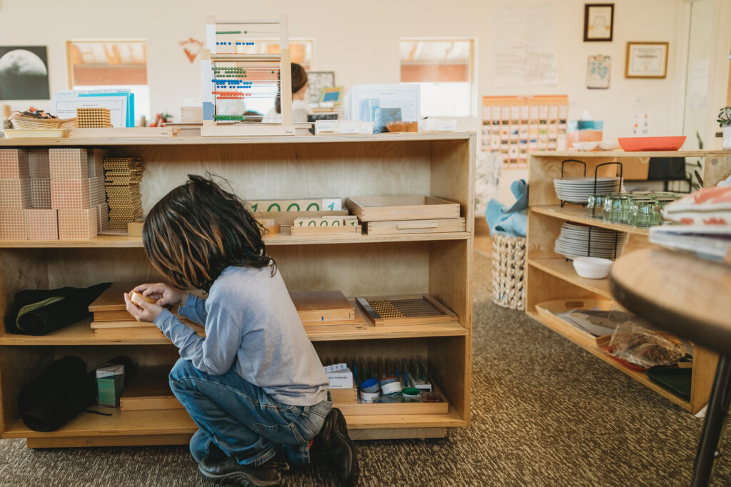 Montessori elementary student working independently at Soaring Wings Montessori School
